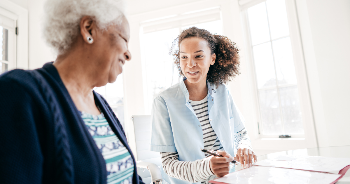 Working for an agency, like this caregiver who’s with a client, can be a choice that leads to a good job.