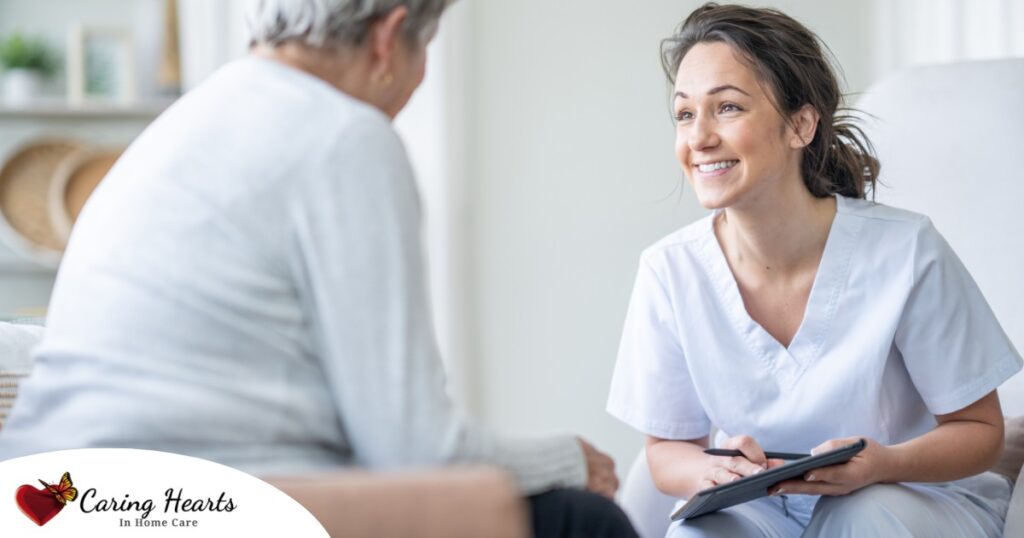 A woman smiles while with a client representing the pros of the home care industry.