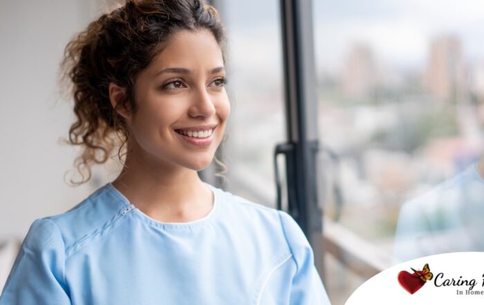 A woman smiles while looking ahead hopefully, showing the positive outlook that planning for a home care career can bring.