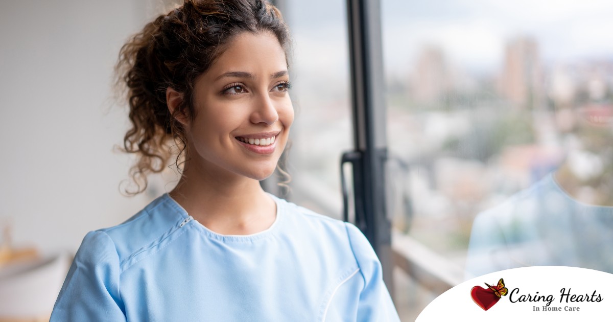 A woman smiles while looking ahead hopefully, showing the positive outlook that planning for a home care career can bring.