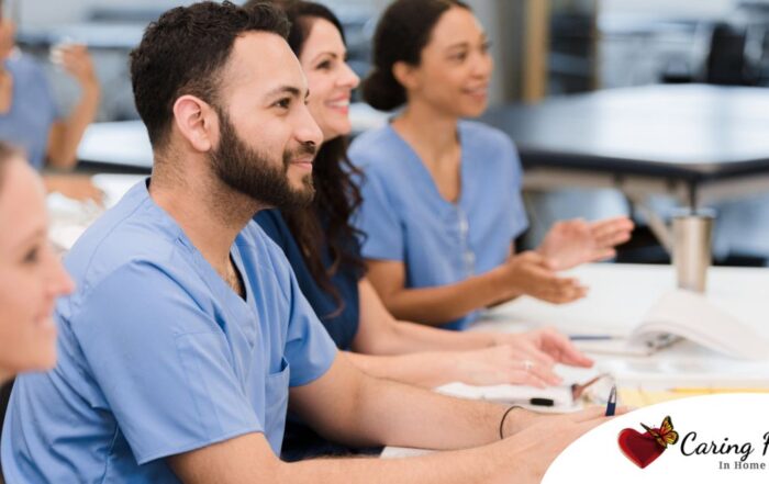 Senior caregivers attend a professional development course.