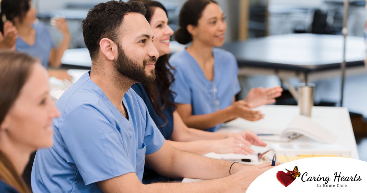 Senior caregivers attend a professional development course.