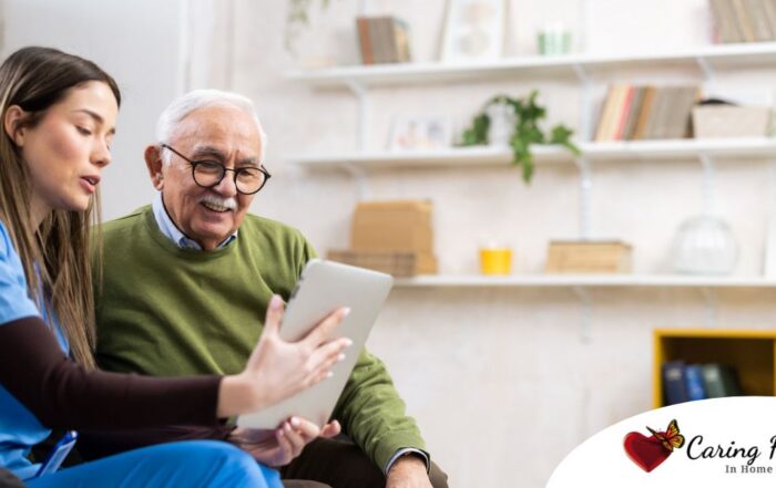 Home caregiver assisting senior man to use telehealth and senior care