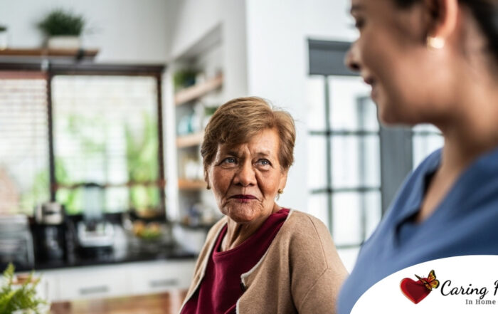 Caregiver provides attentive senior care as part of diabetes awareness